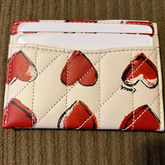 Coach Essential Card Case
With Quilting And Heart Print NWT w/packaging - Picture 2 of 5